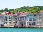 Traditional waterfront houses on the Bosphorus strait, Istanbul, Turkey photo