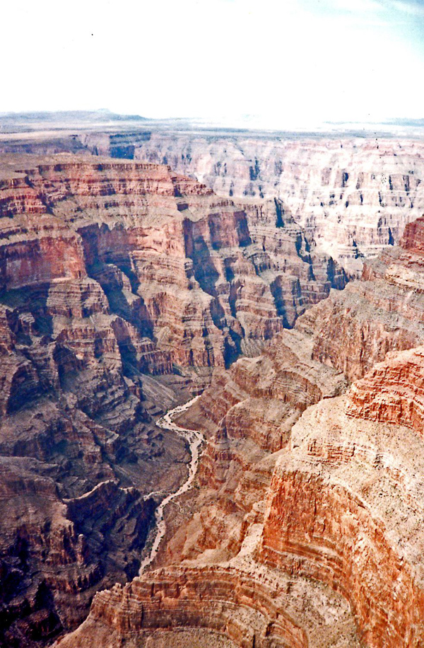 The Colorado River flowing through Grand Canyon, showing 2-billion years old exposed sedimentary layers, United States photo