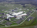 A space shuttle being flown over the Johnson Space Center, Houston, Texas, United States photo